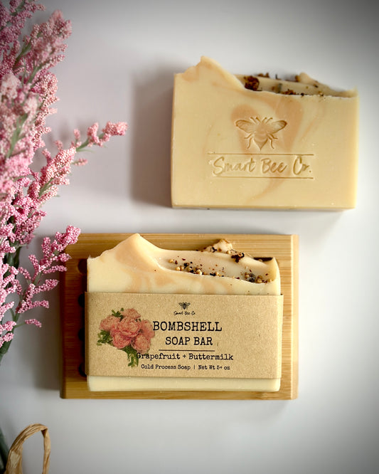 Two soap bars with 'Sweet Bee Co' branding on a light background.