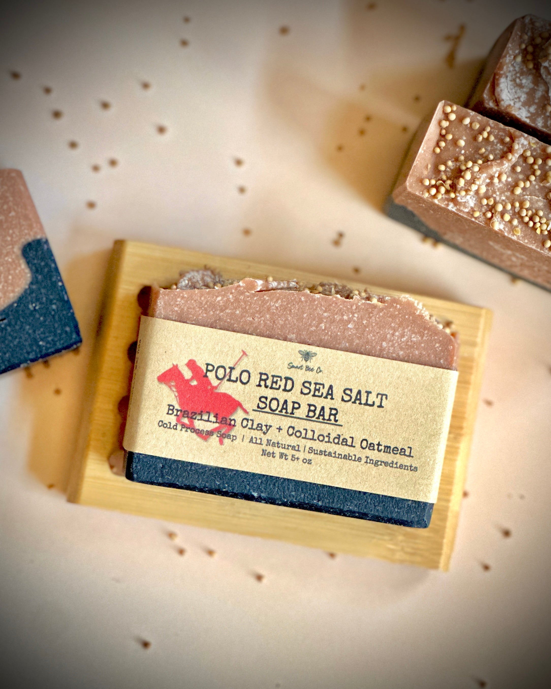 Polo Red Sea Salt Soap Bar with a wooden block on a textured surface
